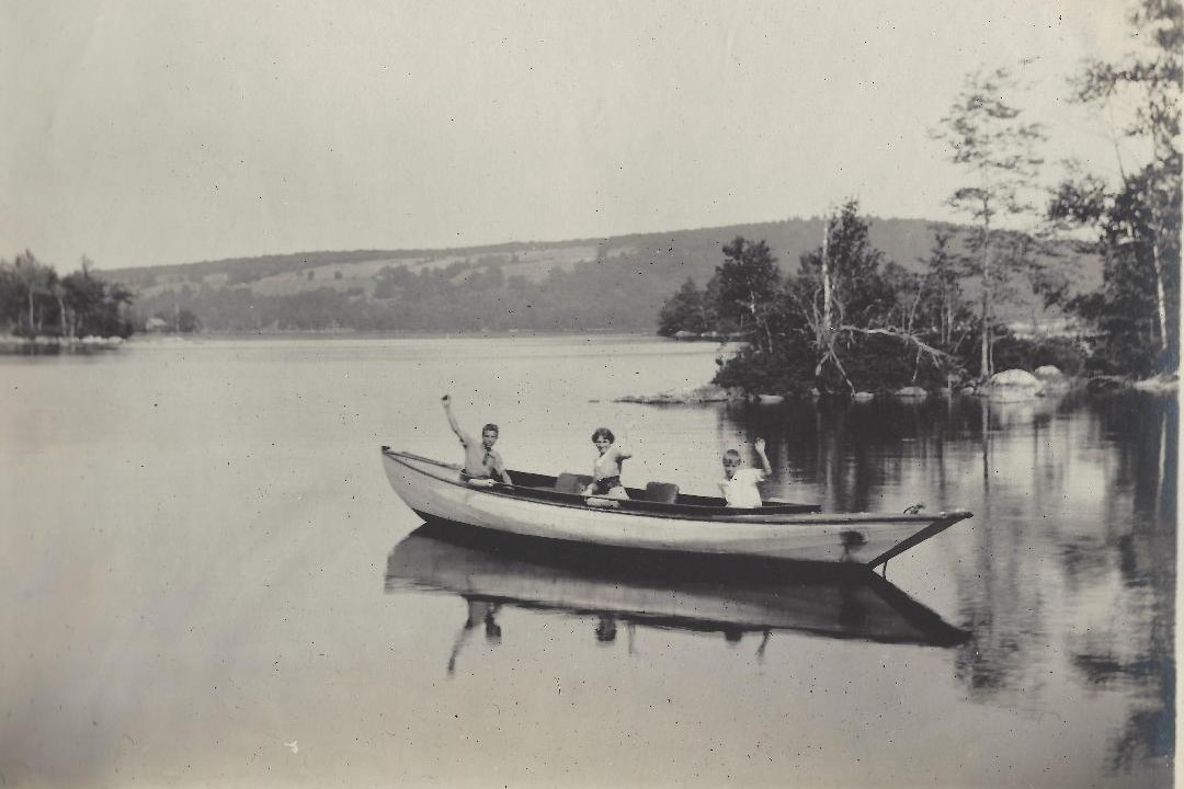 historic picture of a boat in the ferry cove