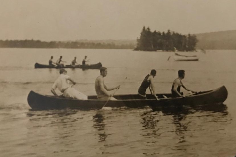 historic picture of a canoe race