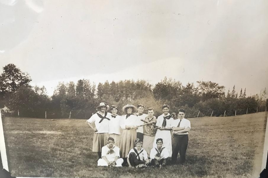 historic picture of a pan-gender softball team